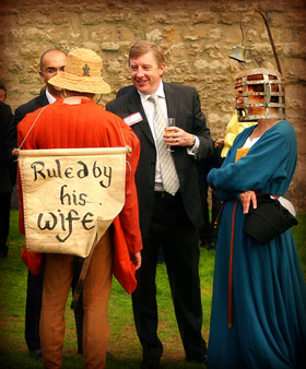 medieval performers mingling with corporate guests
